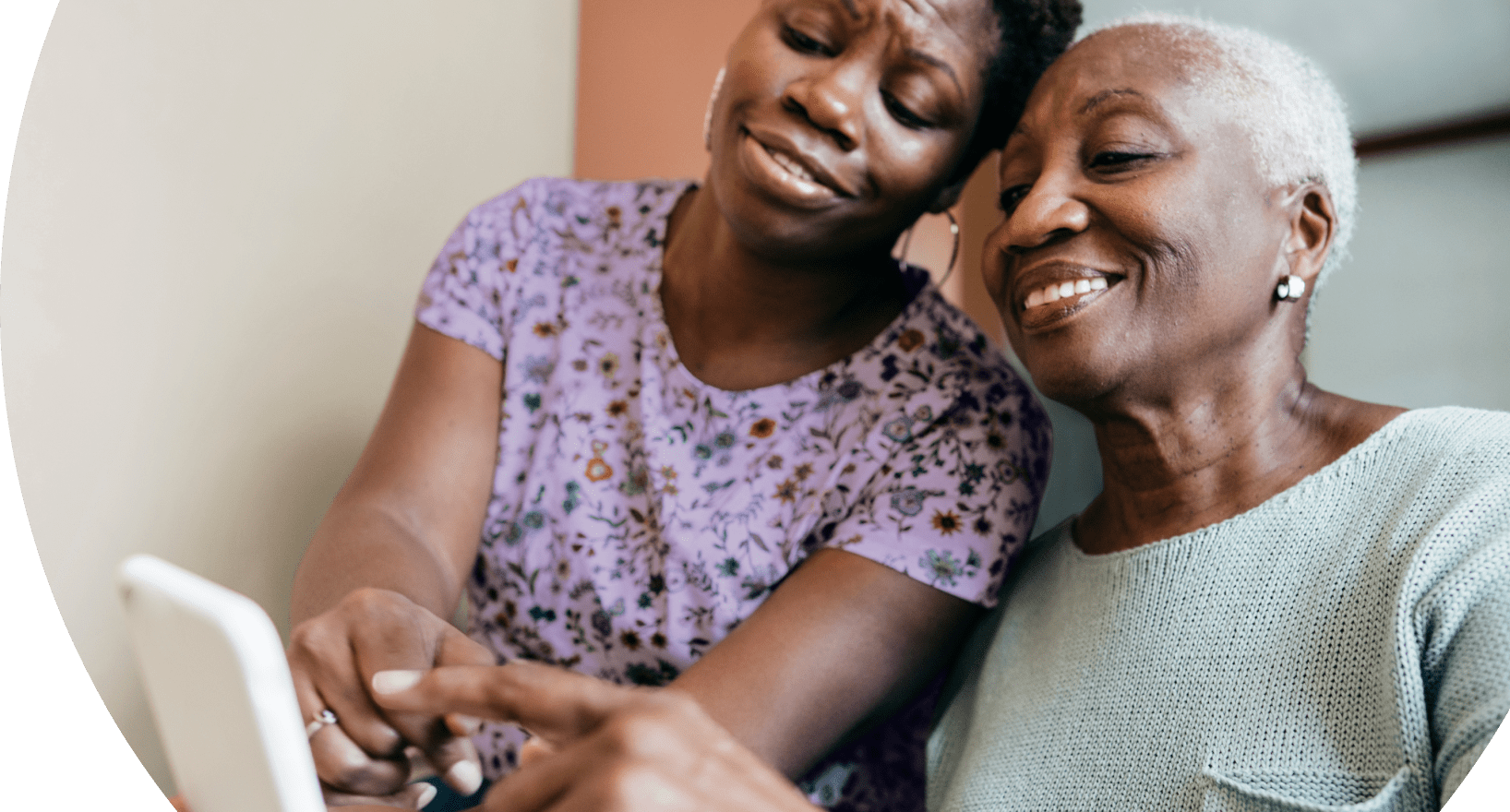 Female caregiver helping her loved one who lives with agitation in Alzheimer's dementia